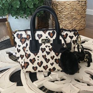 Brand new Betsy Johnson purse. Animal print.